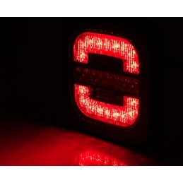 Combined rear lamp with a handle