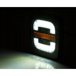 Combined front lamp with a tractor holder