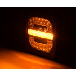 Combined front lamp with a tractor holder