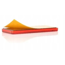 Red rectangular reflector glued on