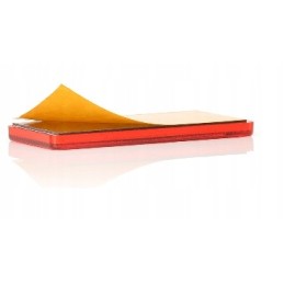 Red rectangular reflector glued on