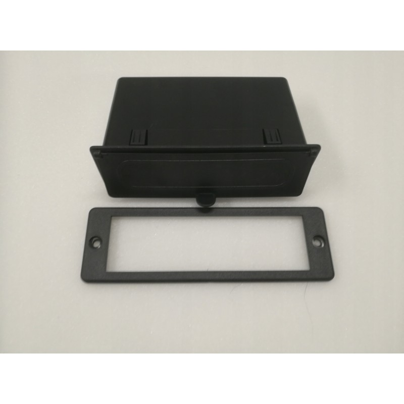 Console panel, storage compartment, radio frame