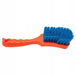 Brush with a short orange handle