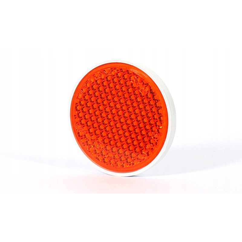 Round orange reflector, glued