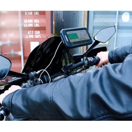 A gift for a motorcyclist for Santa Claus under the Christmas tree, a handlebar mount