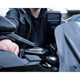 A gift for a motorcyclist for Santa Claus under the Christmas tree, a handlebar mount