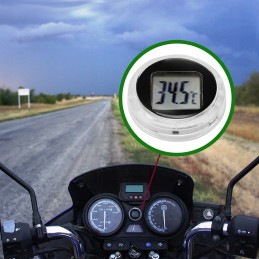 Mini motorcycle thermometer attached to quad bike