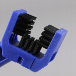 Brush for cleaning the chain and sprockets