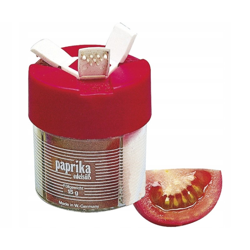 A set of three spices in a travel container