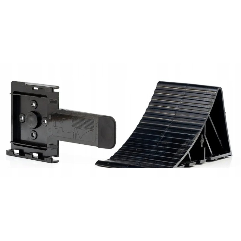 Wedge mounting under the wheel stop of a tow truck trailer