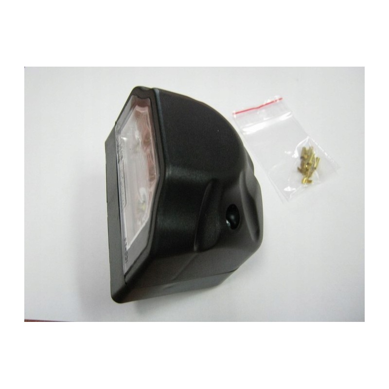 License plate lamp for a camper