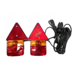 A set of lamps and lights for a magnet machine trailer