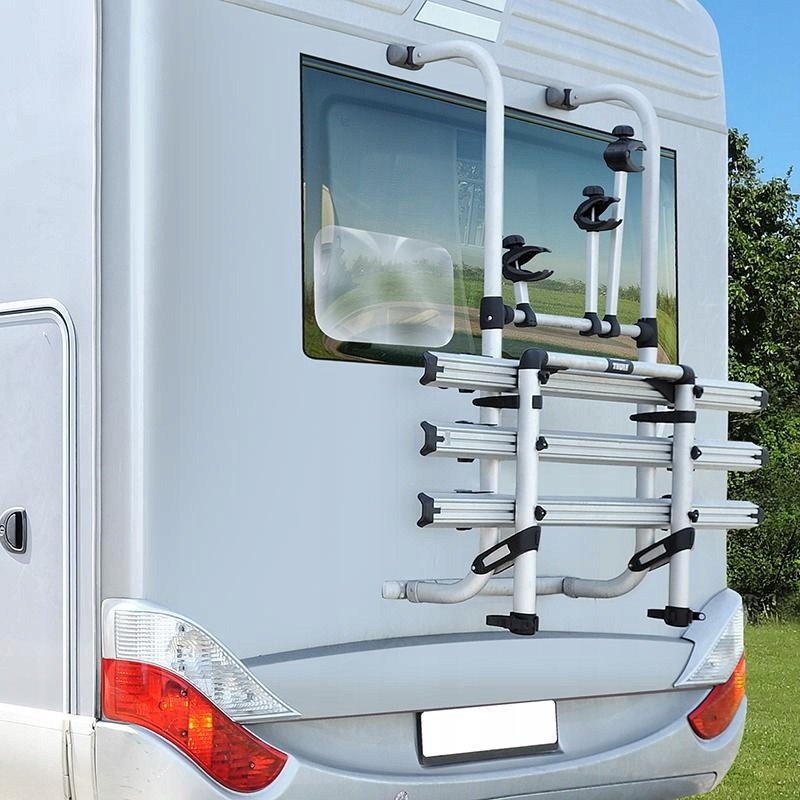 Fresnel reversing lens that enlarges the camper