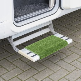 A doormat with a step cover for a camper caravan