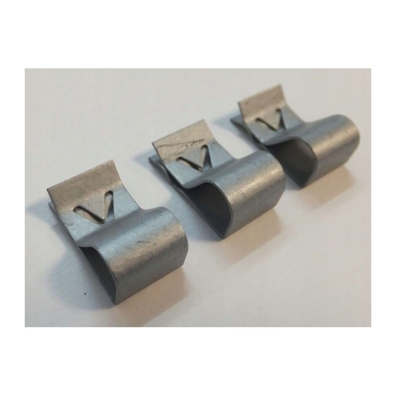 A holder for mounting a thermostat in thetford refrigerators