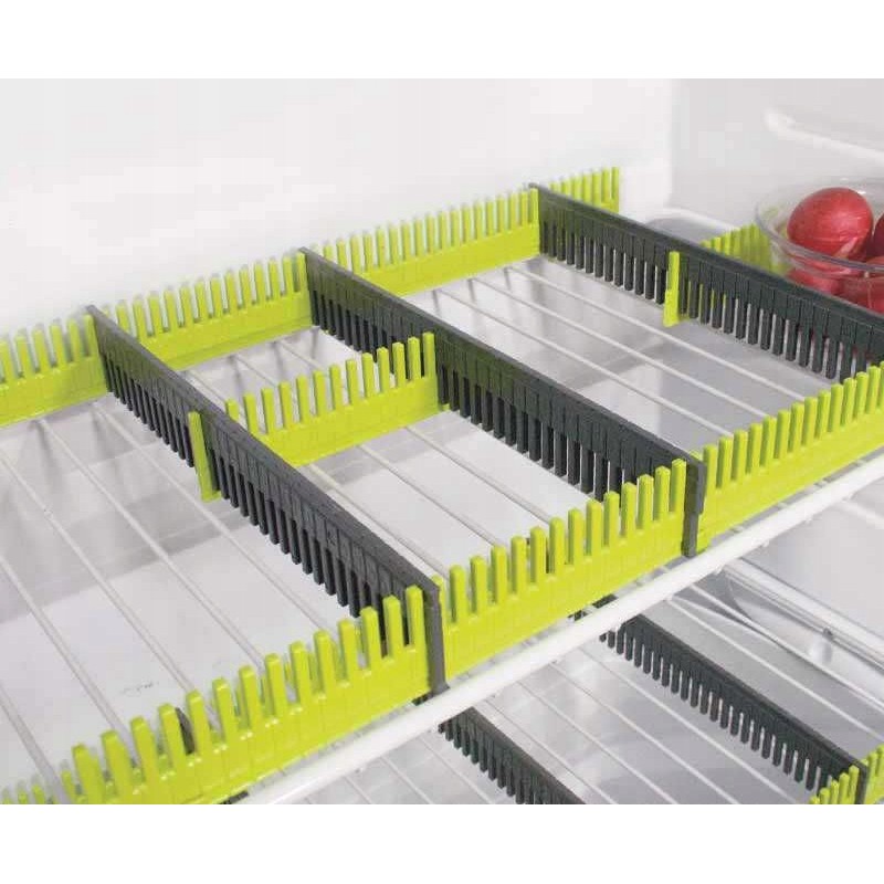 Organizer compartments for the fridge of a camper trailer