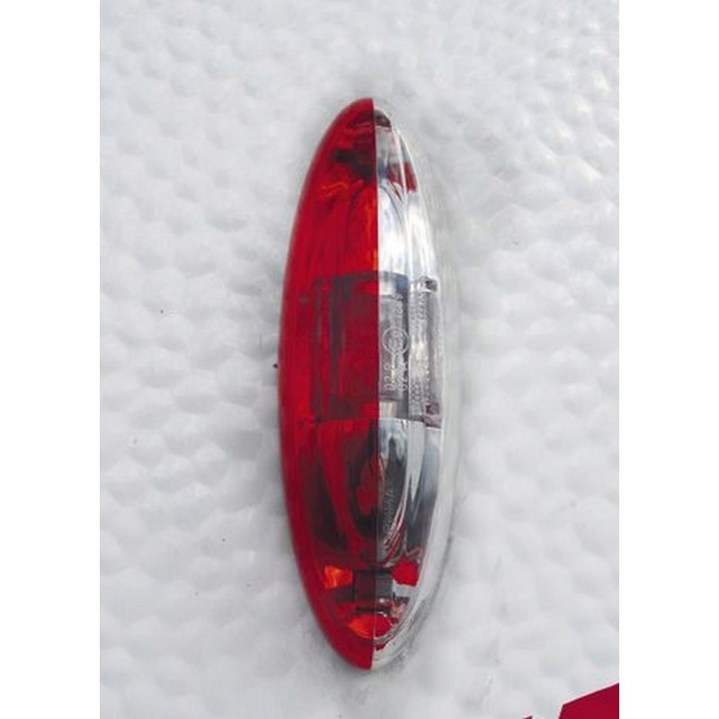 Red and white marker lamp for a camper trailer