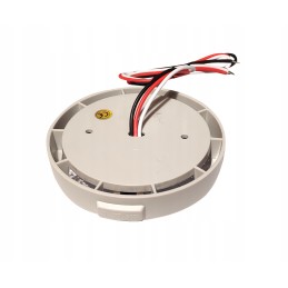 A round lamp with a switch illuminates the camper