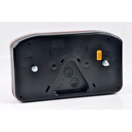 Right rear combination lamp with a reflective triangle