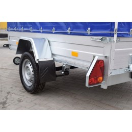 Mounting for holding spring springs in trailers